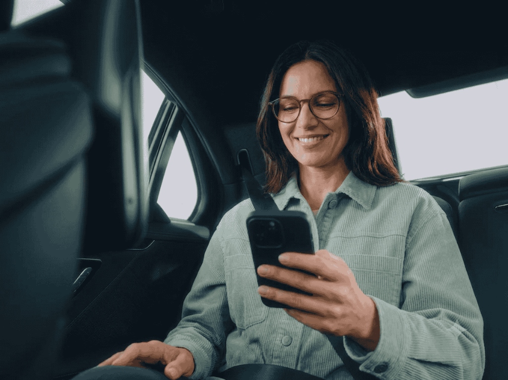 SophRia luxury vehicle door open for shopping passenger